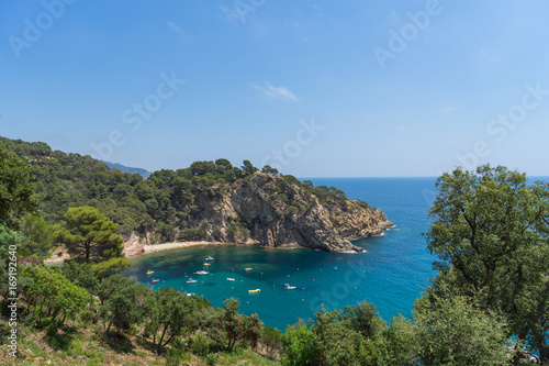 Coves of Cala Llorell beach in Tossa de Mar, Spain