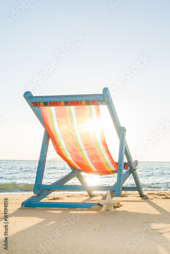 Vászonkép Deck chair at the beach