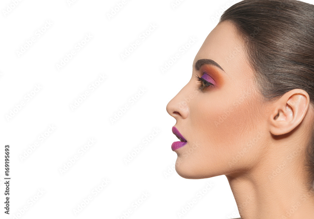Obraz premium beautiful young woman with purple makeup