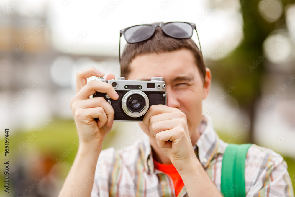 Photo of man with camera Photo of man with camera