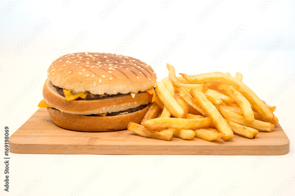 Cheese burger - American cheese burger with Golden French fries Cheese burger - American cheese burger with Golden French fries