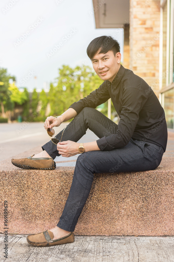 Asian man casual outfits standing in jeans and black denim shirt, men black.  Stock Photo | Adobe Stock