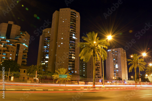 Nice city street with tall buildings at night in Israel Beer sheva © Blend_In