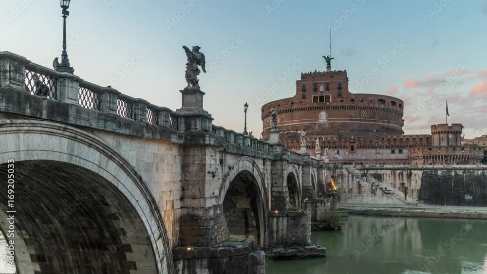Timelapse of Mausoleum of Hadrian (Castel Sant'Angelo castel) with bridge at sunset. Rome, Italy. April, 2016. Timelapse of Mausoleum of Hadrian (Castel Sant'Angelo castel) with bridge at sunset. Rome, Italy. April, 2016.