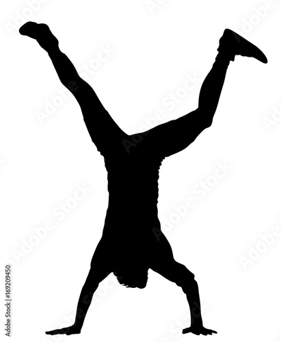 Obraz na plátně Young man doing cartwheel