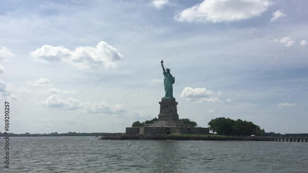 statue of liberty on sea in new york in blue sky statue of liberty on sea in new york in blue sky