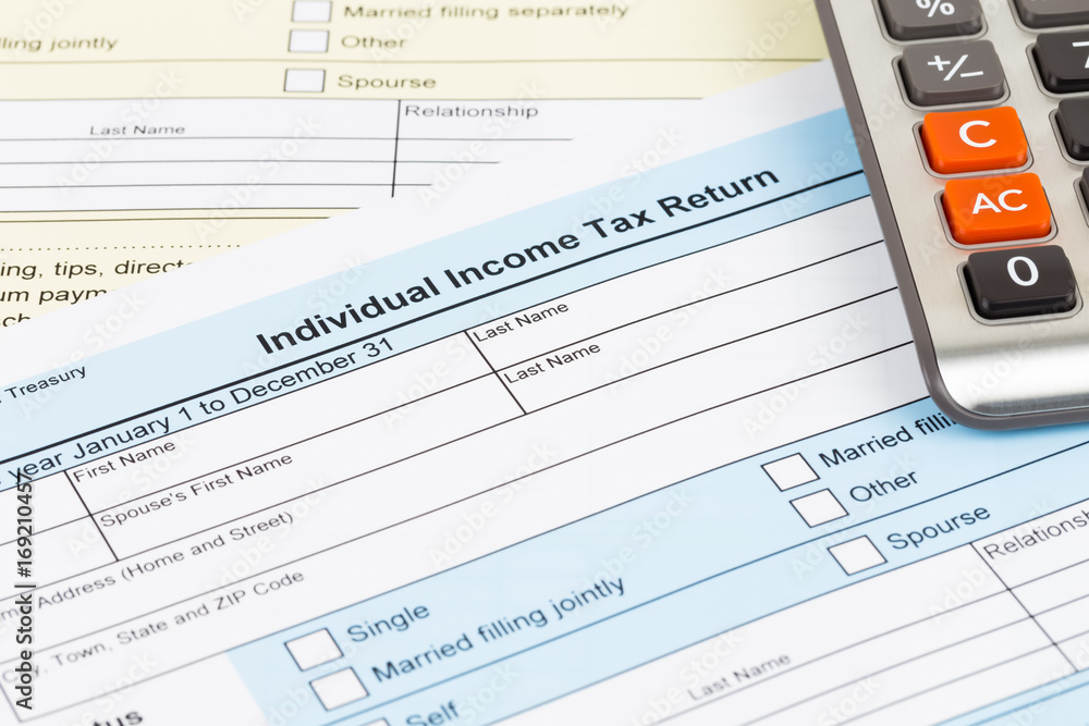 Tax form and calculator; document are mock-up Tax form and calculator; document are mock-up