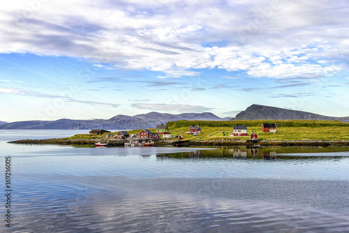 View of small fishing village in Mageroya island, Norway. Mageroya is a large island in Finnmark county, in the extreme northern part of Norway