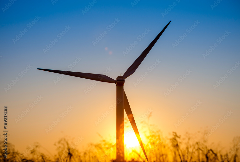 Wind turbine at sunset, Crete, Greece Wind turbine at sunset, Crete, Greece