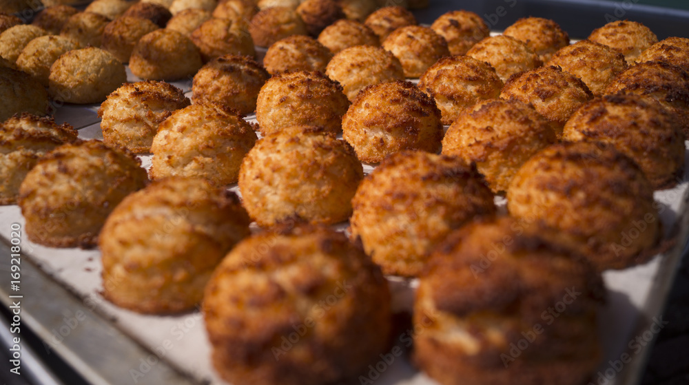 coconutmacaroons lined up nicely on a plate coconutmacaroons lined up nicely on a plate