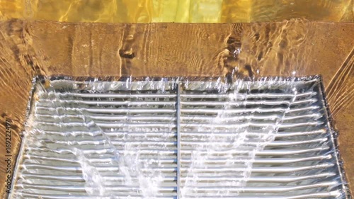 Water draining waterfall pool sanitation