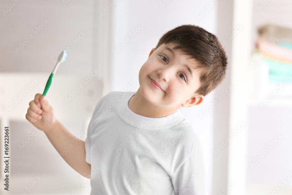 Cute little boy with toothbrush at home. Cleaning teeth concept Cute little boy with toothbrush at home. Cleaning teeth concept