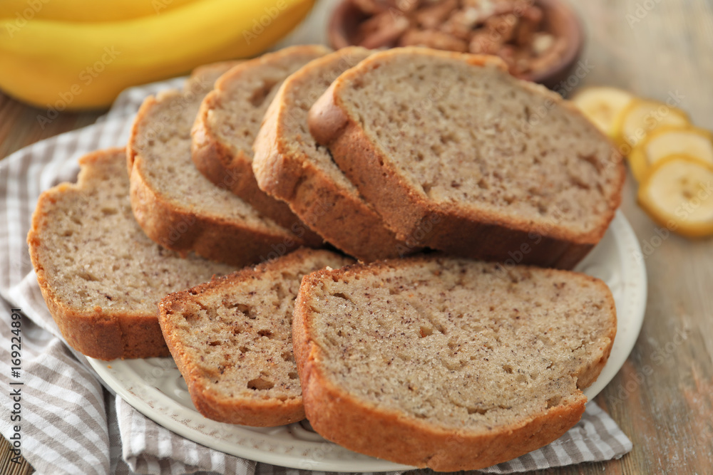 Sliced banana bread on plate