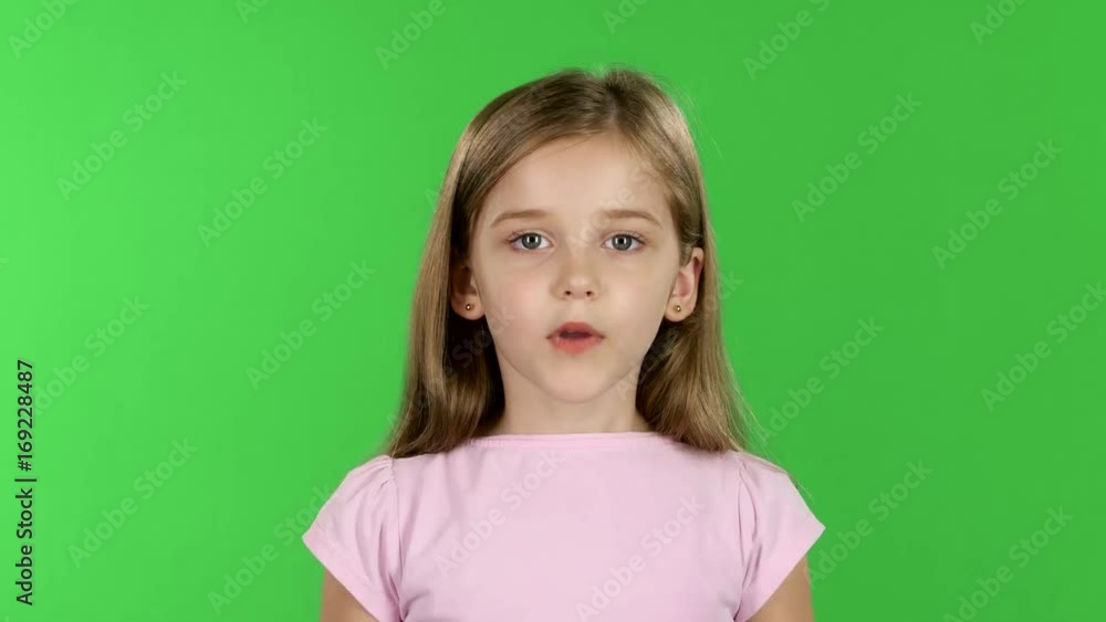 Baby speaks into a shout. Green screen Baby speaks into a shout. Green screen
