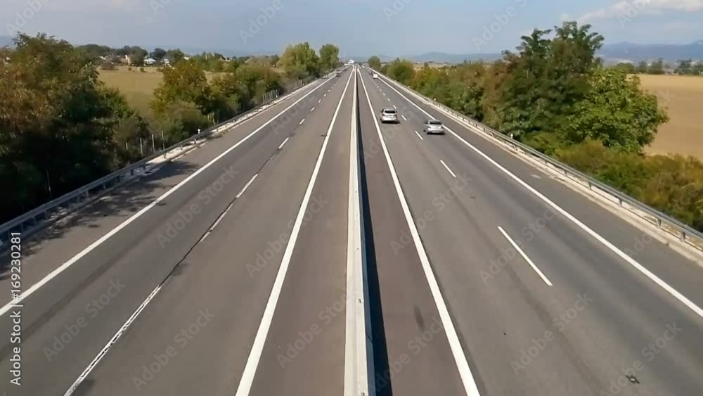 Cars on autobahn time lapse, view from center. Cars on autobahn time lapse, view from center.