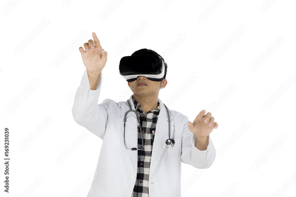Asian doctor wearing virtual reality glasses Asian doctor wearing virtual reality glasses
