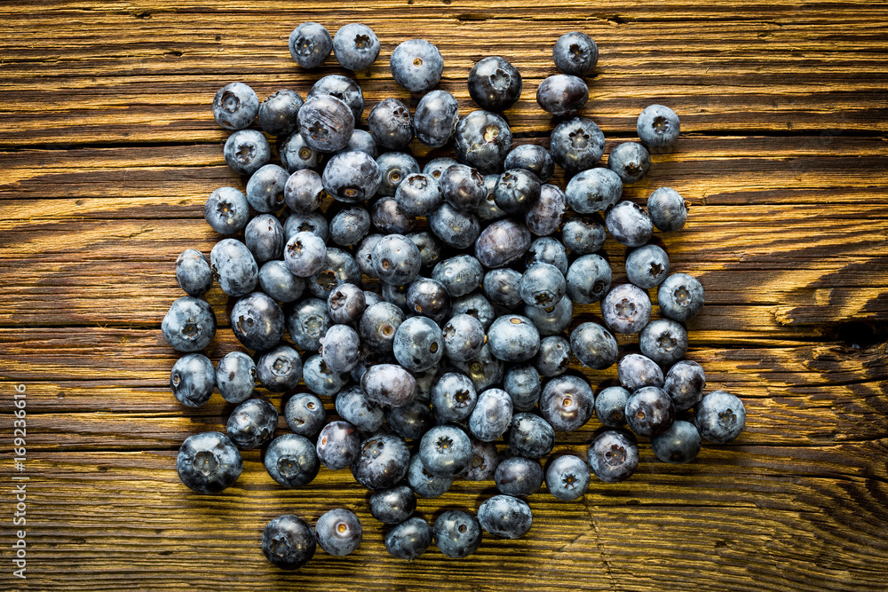 Blueberries on old wooden table Blueberries on old wooden table