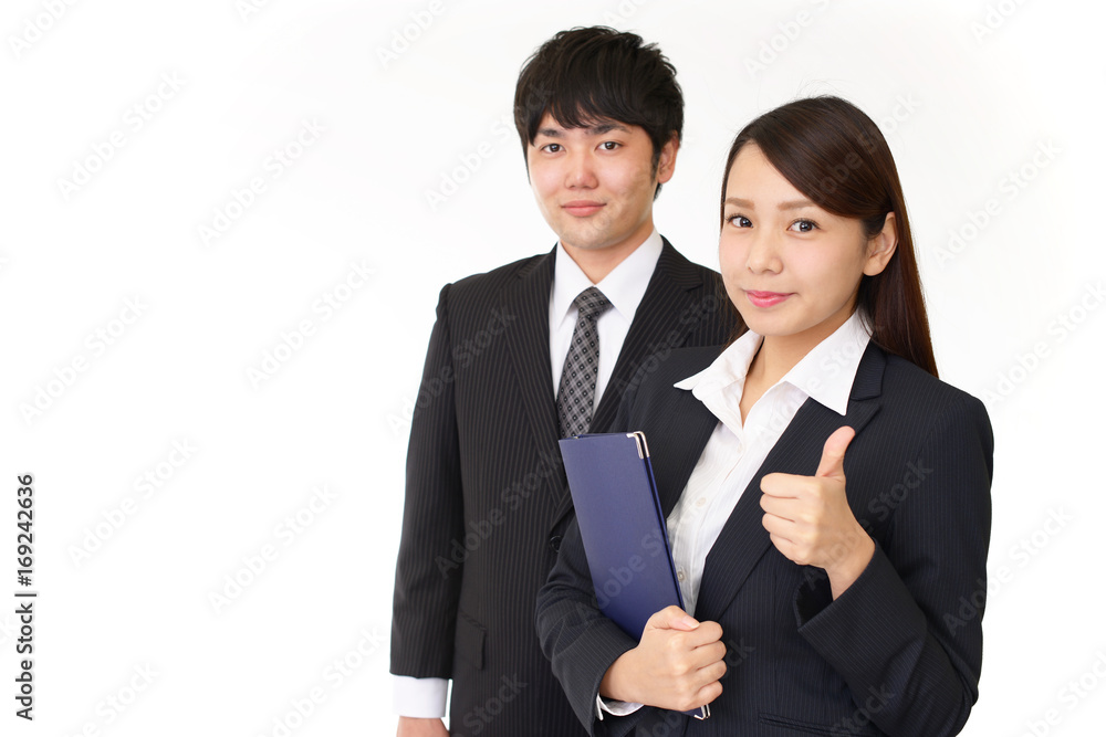 ガッツポーズのOLとビジネスマン