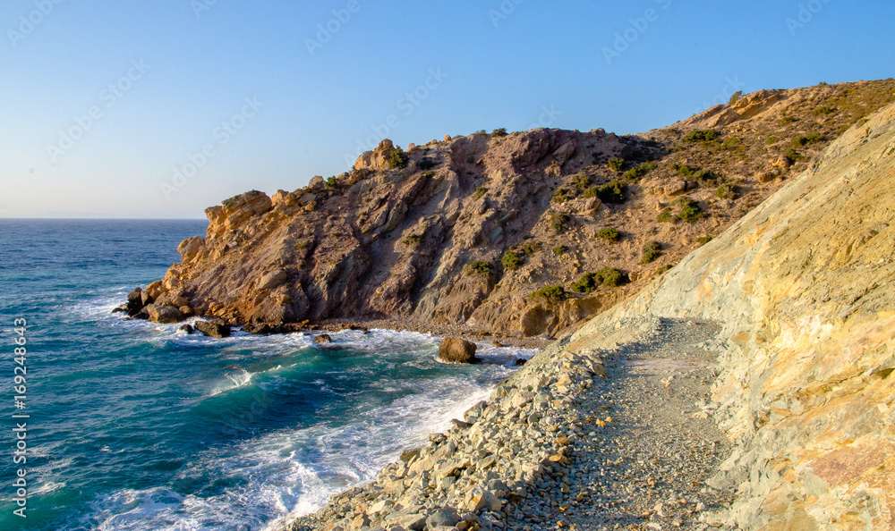 Greek island coast with stone