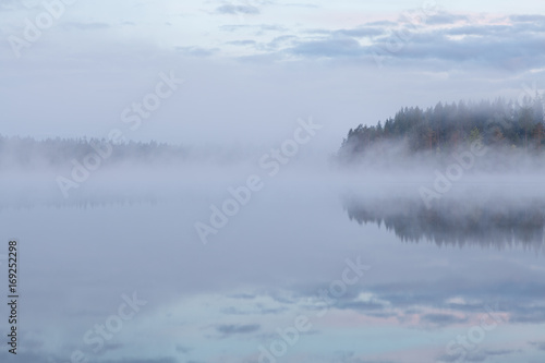 Fototapeta Naklejka Na Ścianę i Meble -  Calm foggy lake scape summer night