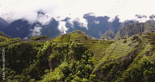Machu Picchu Peru Aerial v8 Flying low around ancient ruins panning
