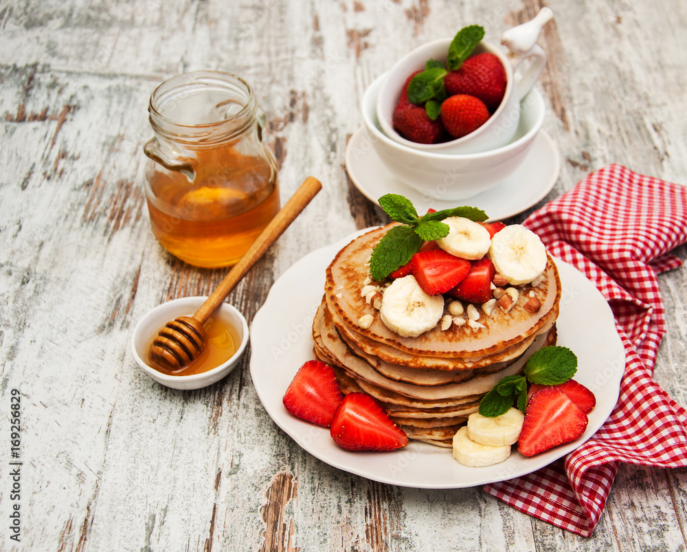 Pancakes with strawberries and bananas Pancakes with strawberries and bananas