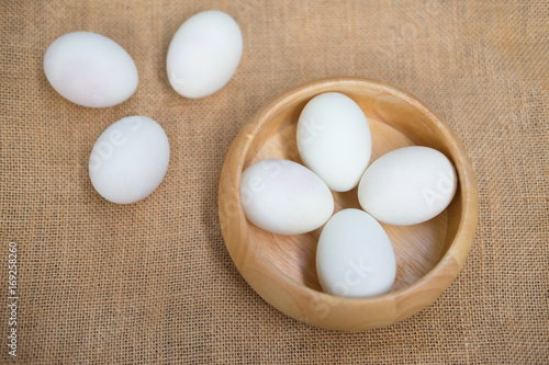 Salted duck eggs on wooden bowl
