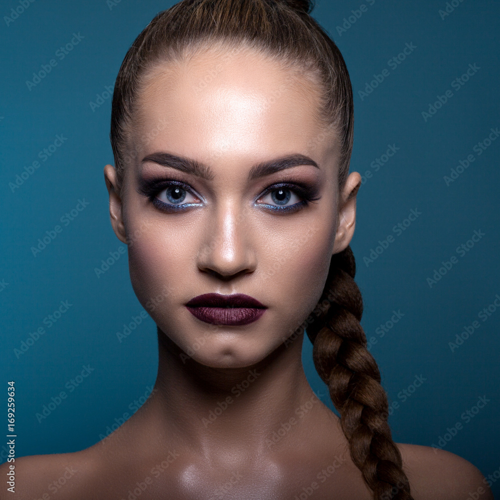 Portrait of a teenage girl with a creative make-up. Portrait of a teenage girl with a creative make-up.