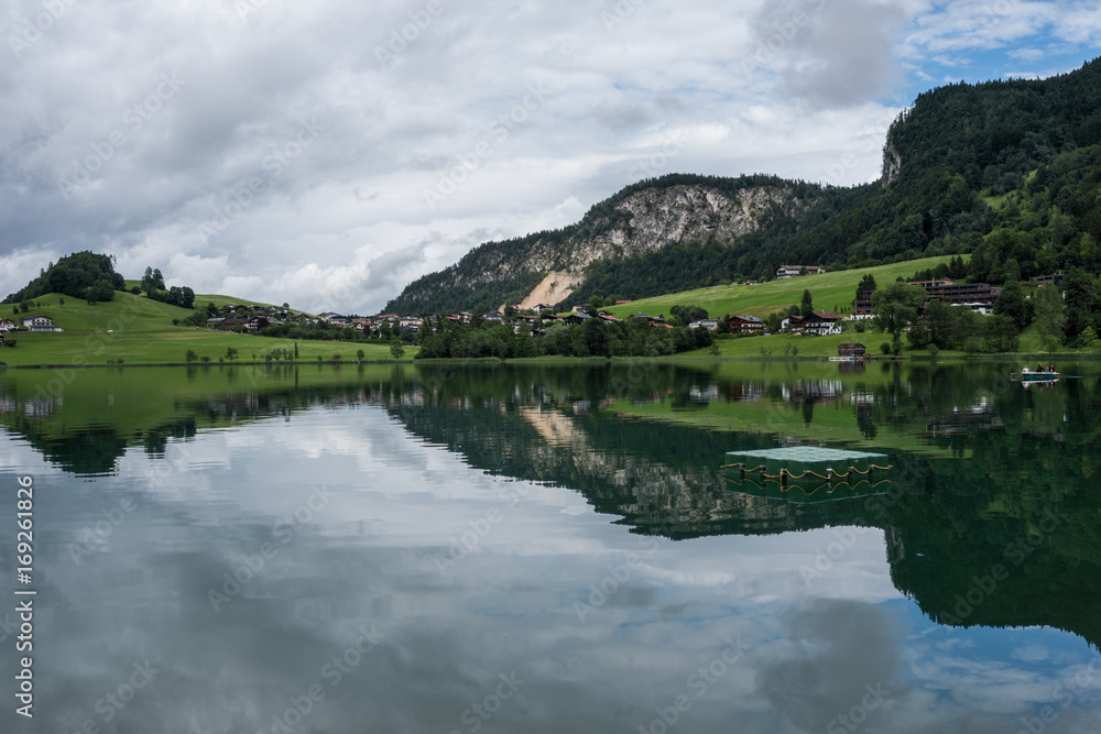 The mountain lake Thiersee in Tyrol, Austria The mountain lake Thiersee in Tyrol, Austria
