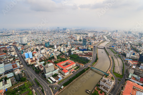 Wallpaper Mural Panoramic view of Ho Chi Minh city (or Saigon) in sunset, Vietnam. Saigon is the biggest city and economic center in Vietnam with population around 10 million people. Torontodigital.ca