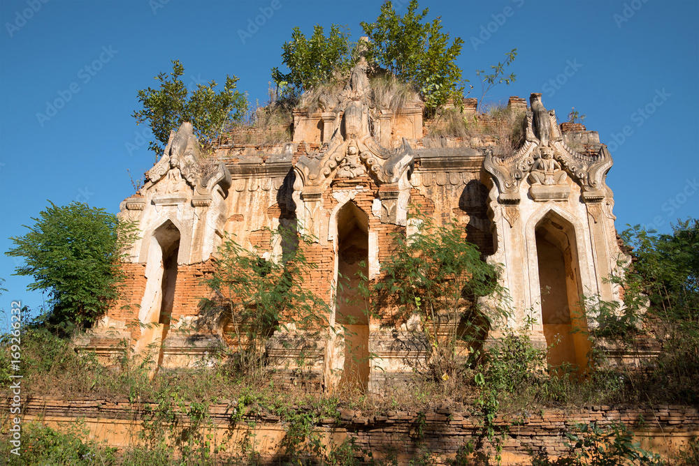 Ruins of the ancient Buddhist temple in the territory of a pagoda of Shwe Indein Pagoda. Vicinities of the Inle lake, Burma