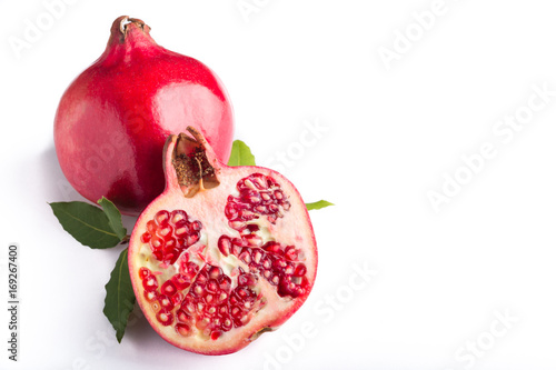 cut out of a pomegranate on a white background photo