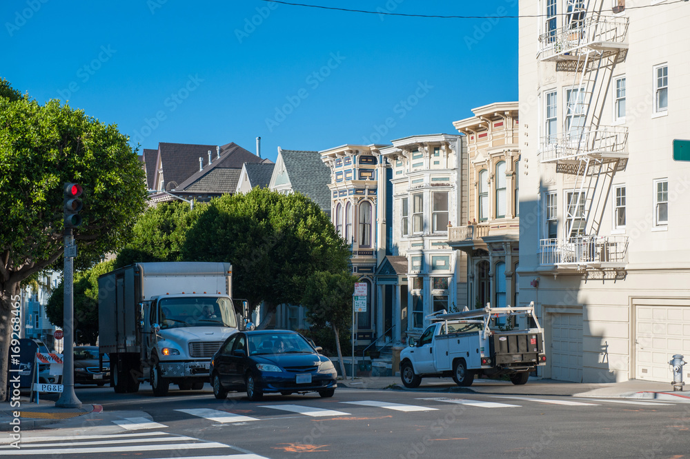 City traffic in San Francisco near the residential buildings in San Francisco California USA