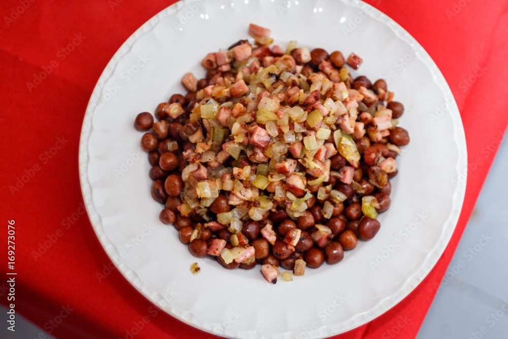 Grey peas with bacon and onions Latvian-style. Traditional national dish for Christmas in Latvia, eastern Europe Grey peas with bacon and onions Latvian-style. Traditional national dish for Christmas in Latvia, eastern Europe
