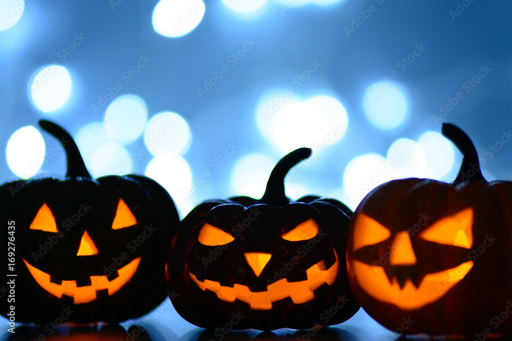 Three scary pumpkins with hats Three scary pumpkins with hats
