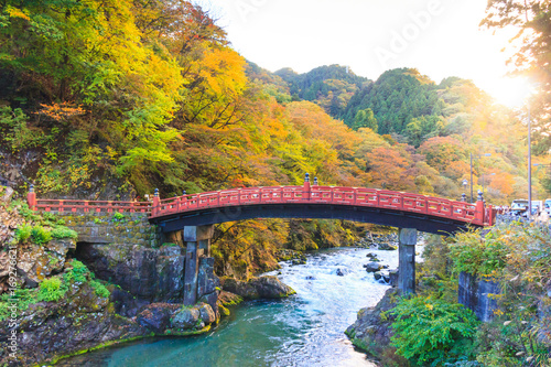 Nikko red Shinkyo bridge in autumn season.