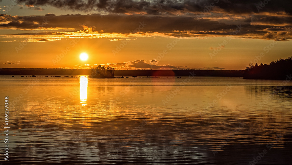Closeup to Swedish lake sunset in summer time