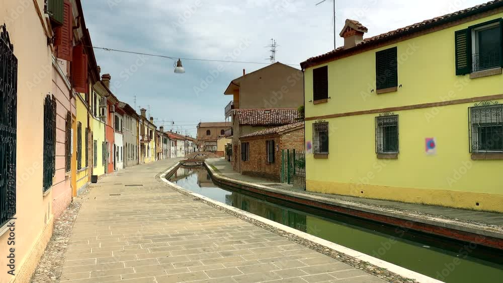 timelapse shot of ancient street canal in Comacchio, lagoon village near Ferrara timelapse shot of ancient street canal in Comacchio, lagoon village near Ferrara