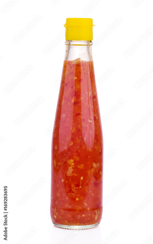 Bottle of spicy, red hot sauce isolated on white background Bottle of spicy, red hot sauce isolated on white background