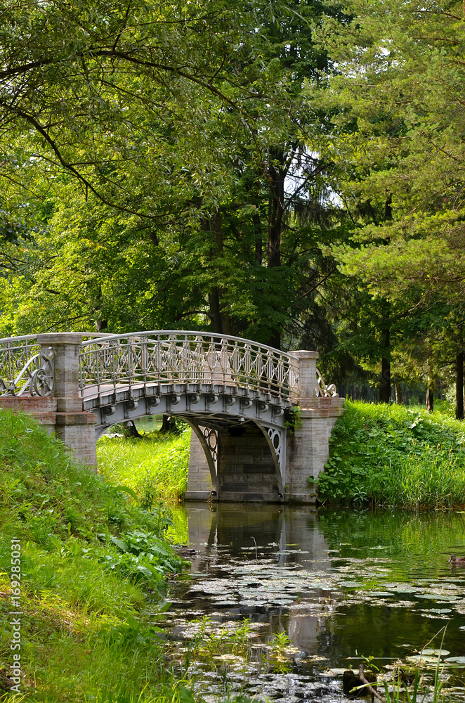 Wrought metal bridge in Gatchina near St. Petersburg, Russia Wrought metal bridge in Gatchina near St. Petersburg, Russia