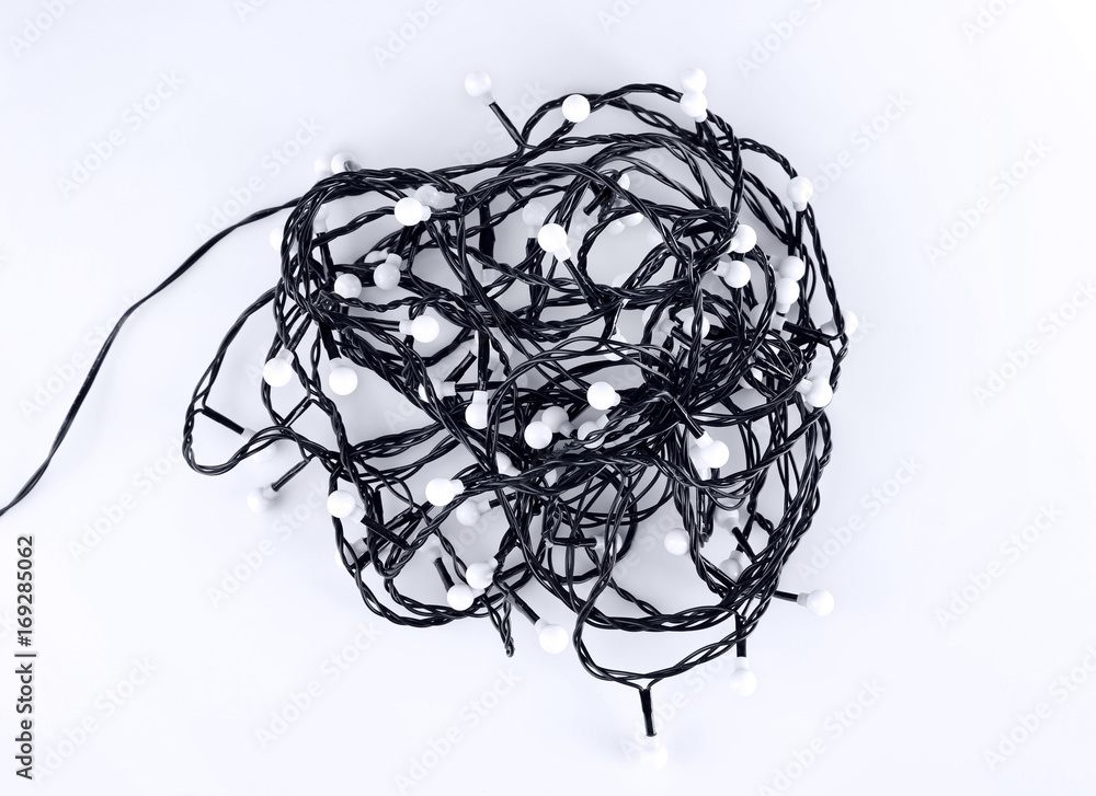 Tangled Christmas garland on white background Tangled Christmas garland on white background