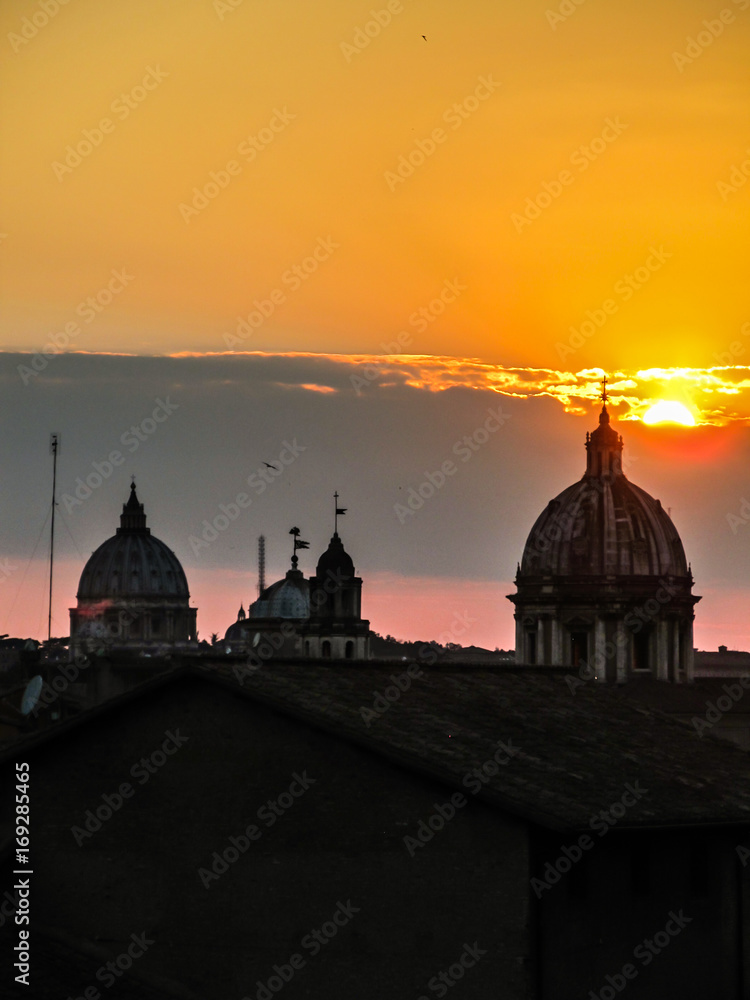 Sunset in Rome - cityscape with church domes