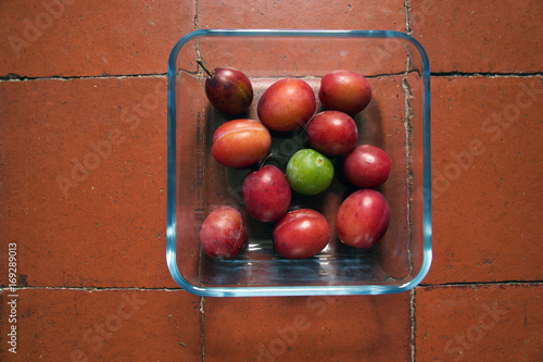 Plums red and green