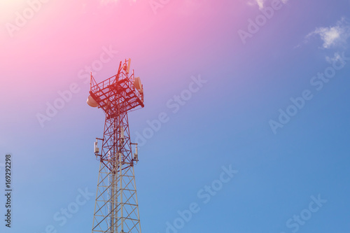 Satellite dish telecom network at communication technology network. Cell tower on sky background