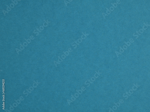 Turquoise paper texture. Colored textured cardboard