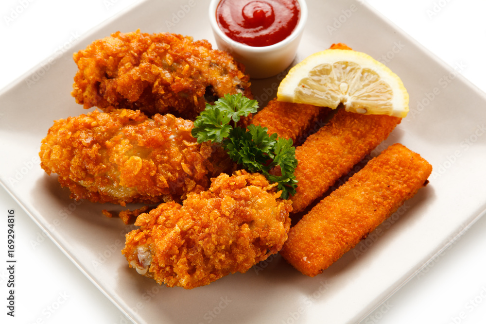 Fried fish fingers with chicken nuggets Fried fish fingers with chicken nuggets
