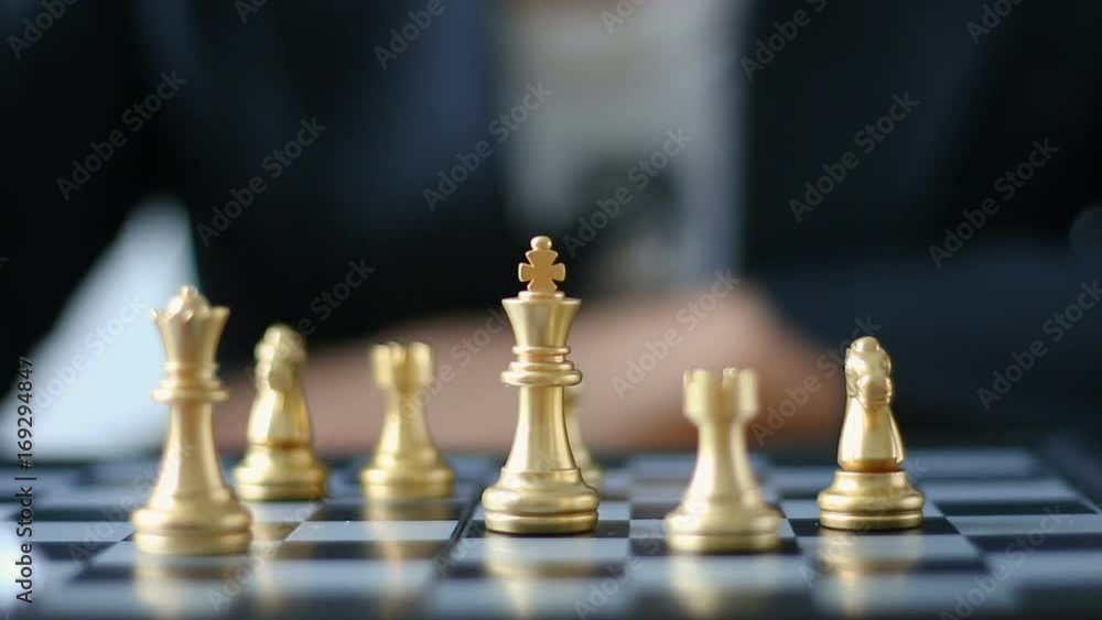 Close up shot hand of business woman moving golden chess to defeat a silver king chess on white and black chess board for business challenge competition winner and loser concept
Close up shot hand of business woman moving golden chess to defeat a silver king chess on white and black chess board for business challenge competition winner and loser concept