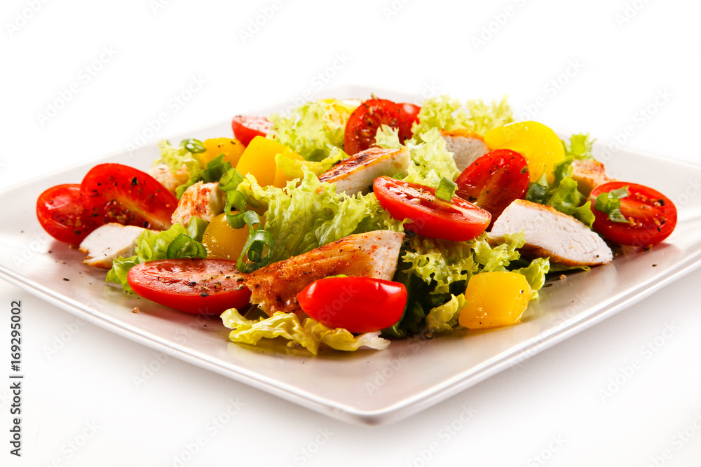 Grilled chicken strips with vegetable salad Grilled chicken strips with vegetable salad