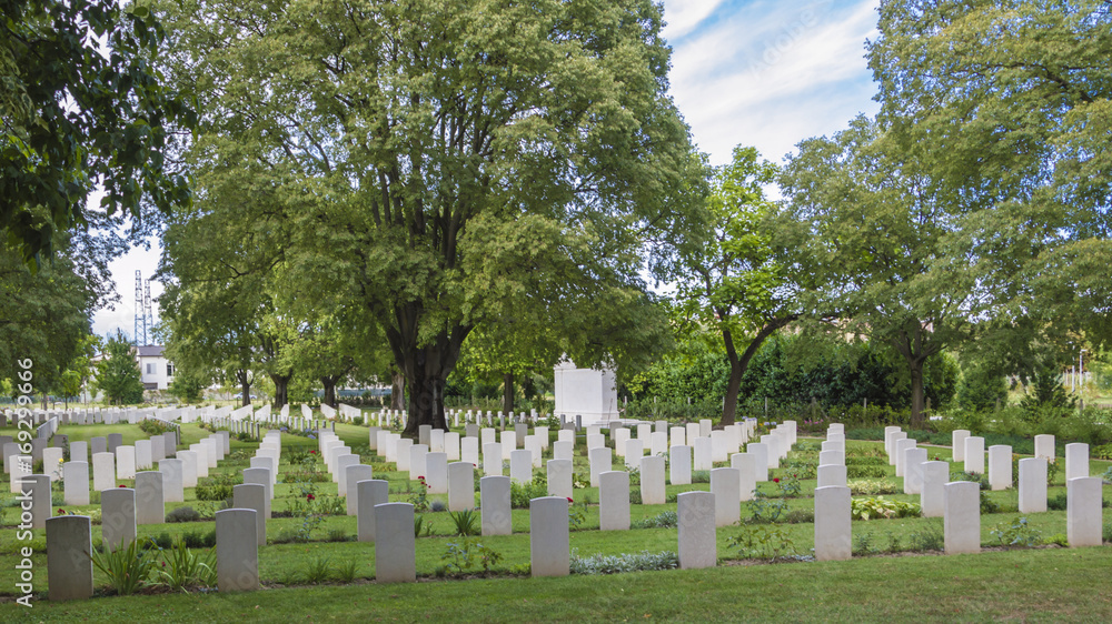 Rows of white headstones at the British Indian Army Cemetery of war placed in Forli, Italy (second world war).