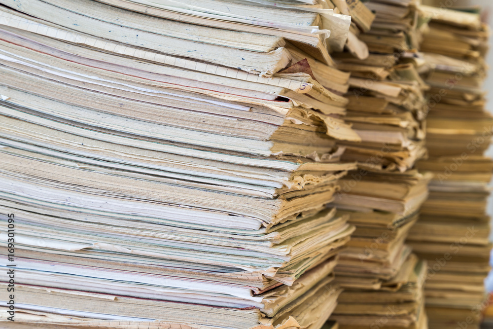 A stack of old school notebooks. Multicolored cover. A stack of old school notebooks. Multicolored cover.